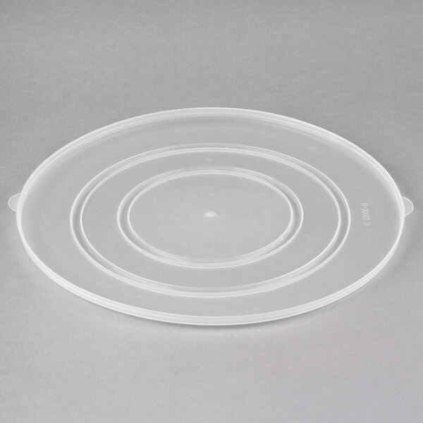 A clear plastic lid with a circular rim.