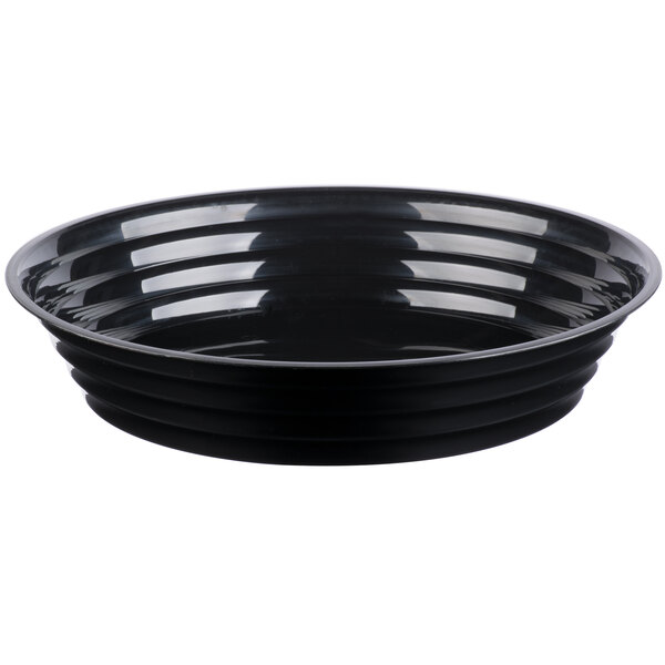 A close-up of a black Fineline low profile catering bowl with ripples.