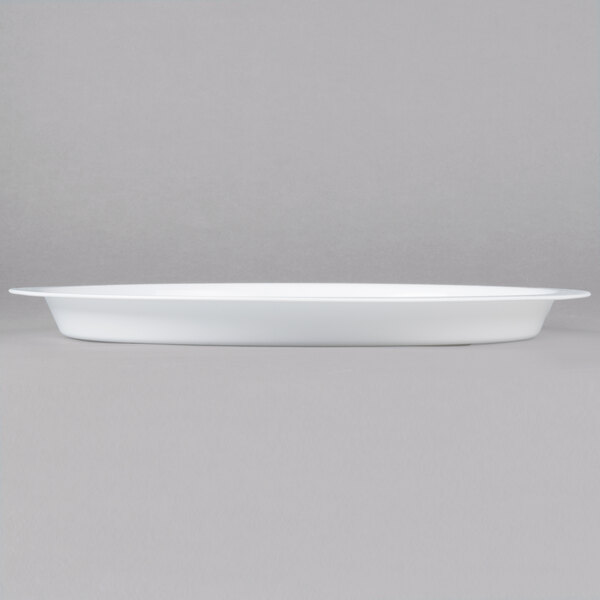 A white oval Fineline plastic catering tray.