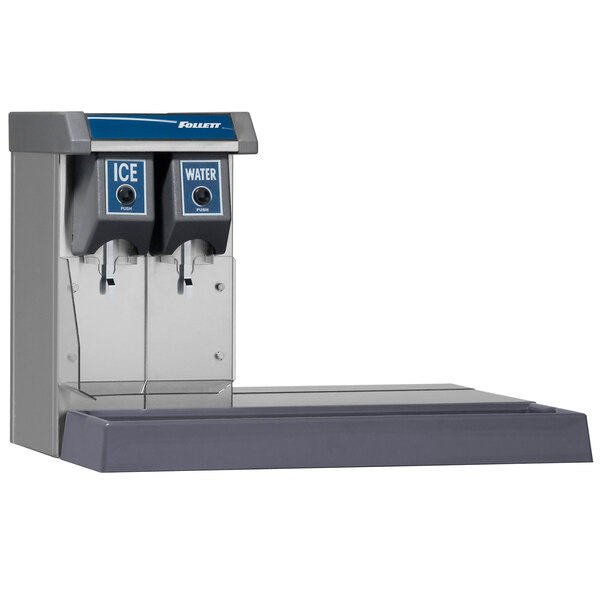 A Follett Vision countertop ice and water dispenser with two levers above two dispensers.
