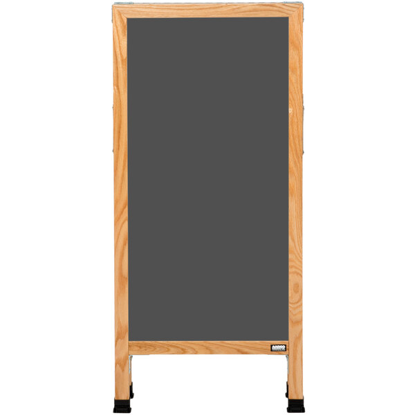 An Aarco oak A-frame sign board with a black slate chalk board.