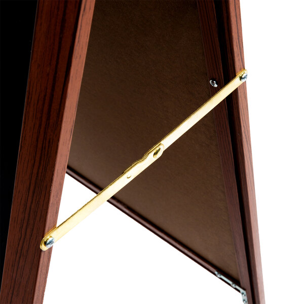 A cherry wood A-Frame sign board with a black write-on board inside.