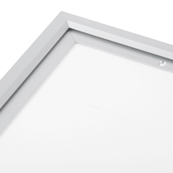 A close-up of a silver Aarco aluminum slide frame.