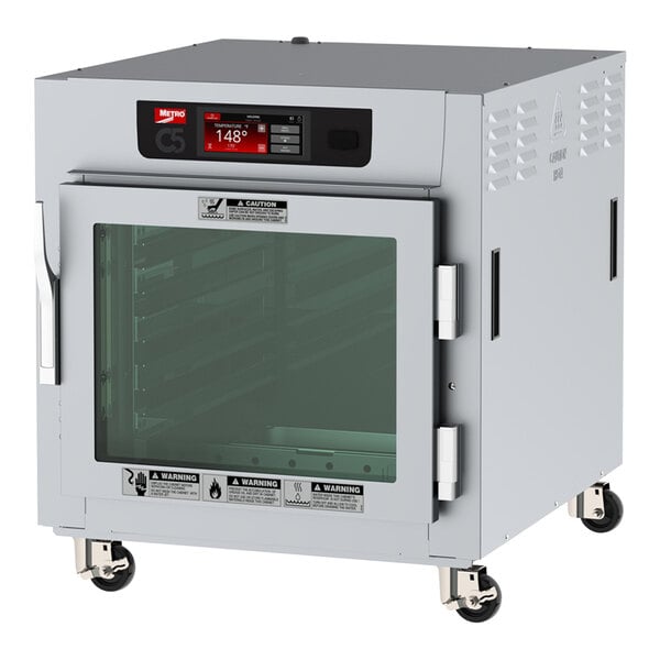 A large grey Metro C5 series undercounter heated holding cabinet with a clear glass door.