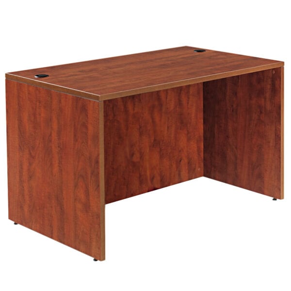 a wooden desk with a hole in the top