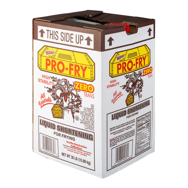 A large rectangular box labeled 'PRO-FRY' containing liquid shortening for frying, with nutritional information and handling instructions printed on the sides.
