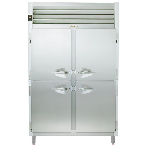A white Traulsen reach-in refrigerator with two half doors.