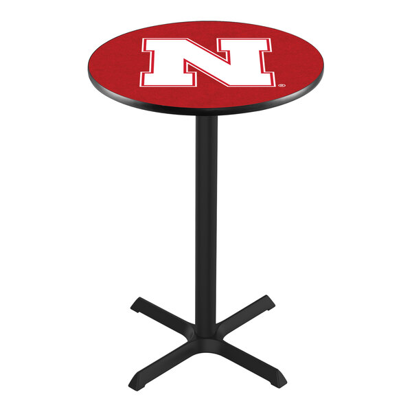 A round bar-height pub table with a red top featuring a large white 'N' logo and a black pedestal base.