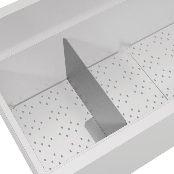 a white rectangular object with holes