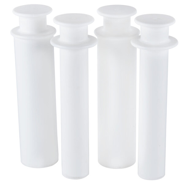 A white rectangular object with three round white tops.