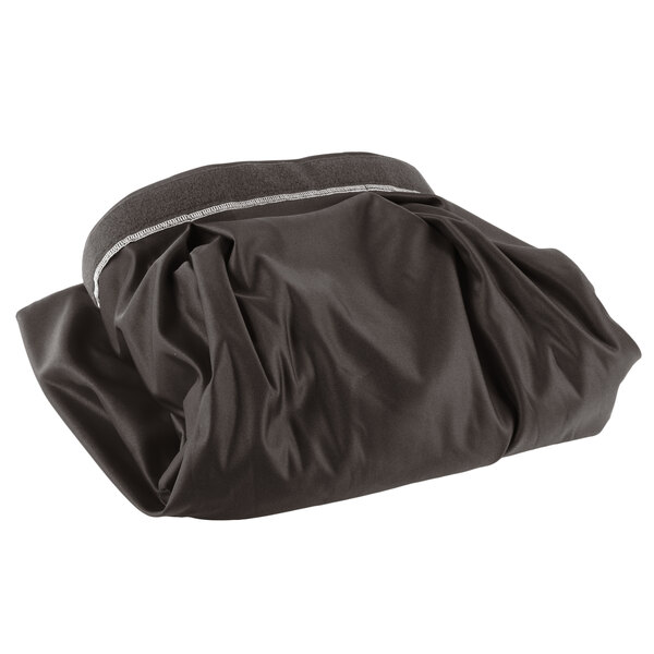 A black bag with a white stripe containing Snap Drape Wyndham table skirting.