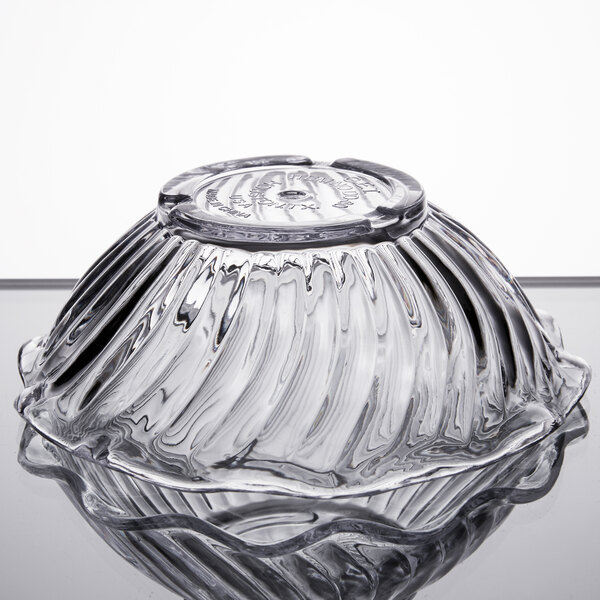 A clear GET dessert dish with a curved edge.
