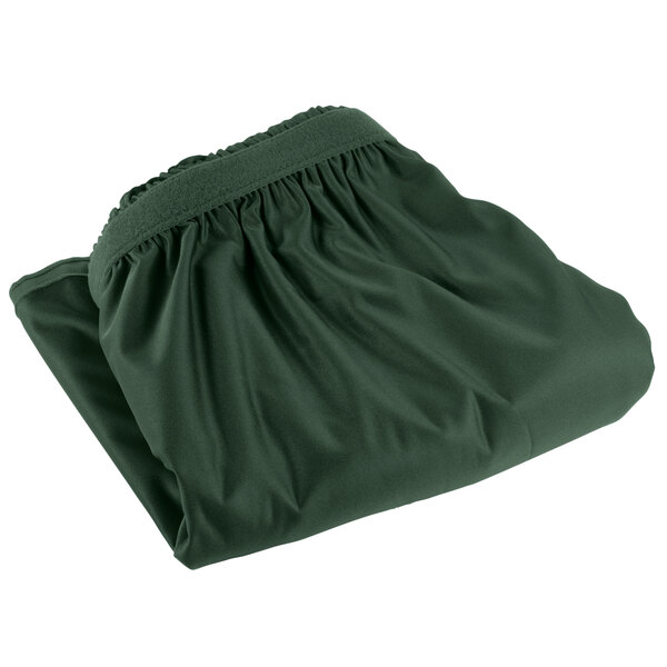 A folded jade green Snap Drape table skirt with Velcro clips.