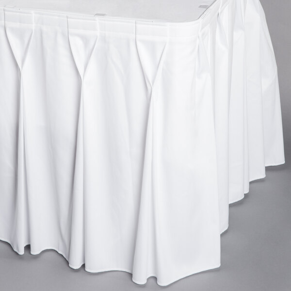 a white table cloth with a white tablecloth