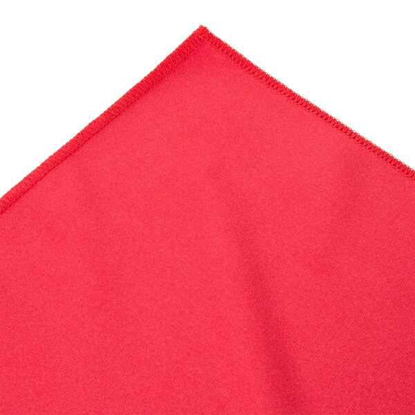 a red cloth with a stitched edge