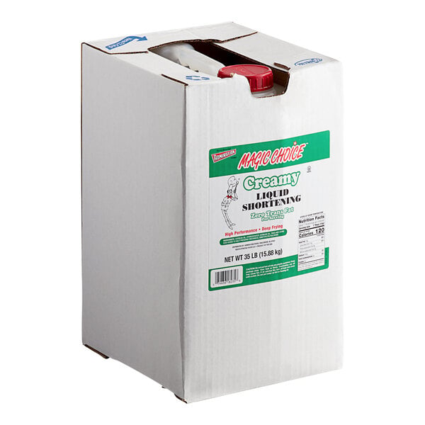 A large white box with a green and red label containing creamy liquid shortening, featuring a red cap visible through an opening at the top.