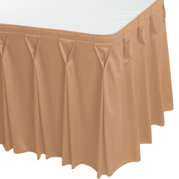 a table with a ruffled skirt