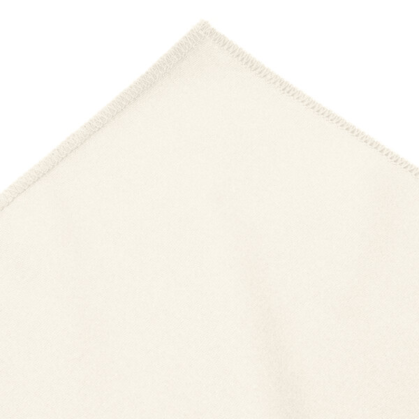 A white table skirt with a continuous pleated edge.