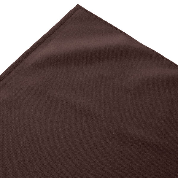 a brown cloth with a white edge