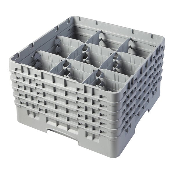 A soft gray plastic Cambro glass rack with 9 compartments and extenders.