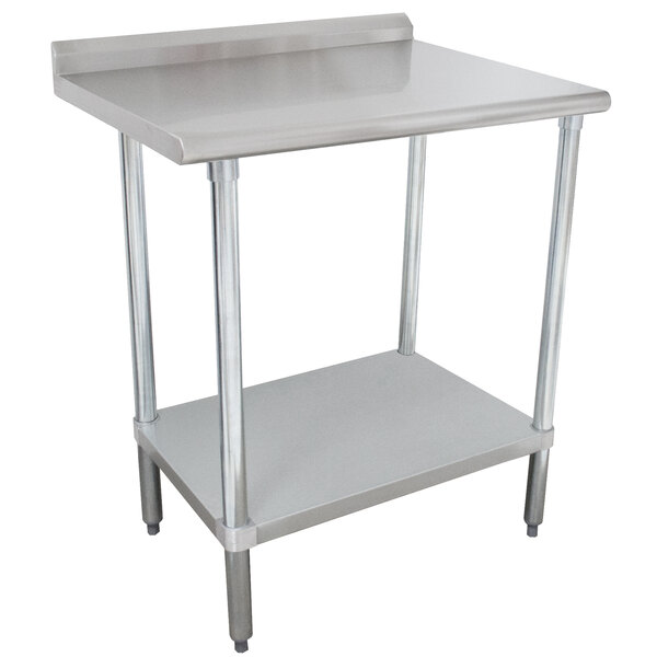 A stainless steel Advance Tabco work table with a stainless steel undershelf.