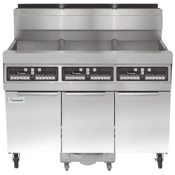 A large commercial Frymaster gas floor fryer system with three drawers.