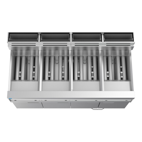 A commercial four-unit natural gas floor fryer system with Thermatron controls and a built-in filtration system.