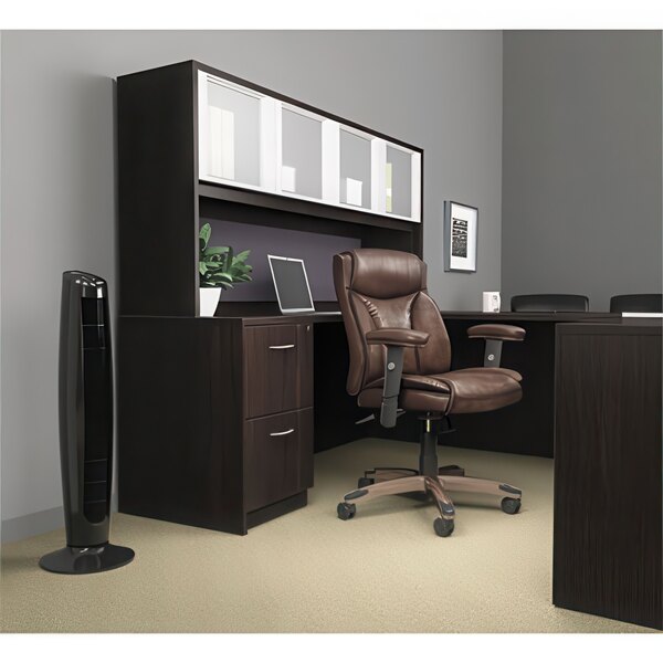An Alera Valencia espresso full pedestal under a brown desk with a brown office chair.