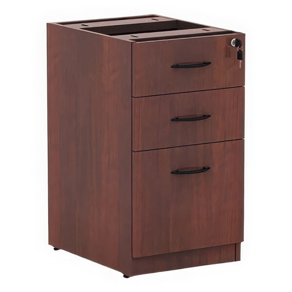 A medium cherry wooden filing cabinet with three drawers.