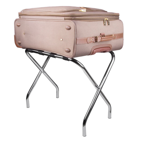 A CSL chrome metal luggage rack holding a suitcase.