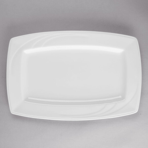 A white Libbey rectangular porcelain plate with curved edges.