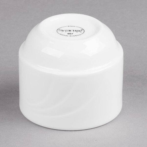 A white round porcelain bouillon cup with a logo on it.