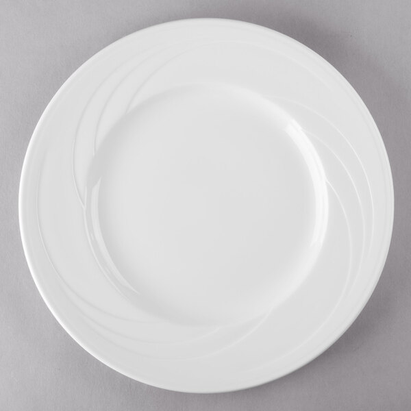 A white Libbey porcelain plate with a wide rim and circular design.