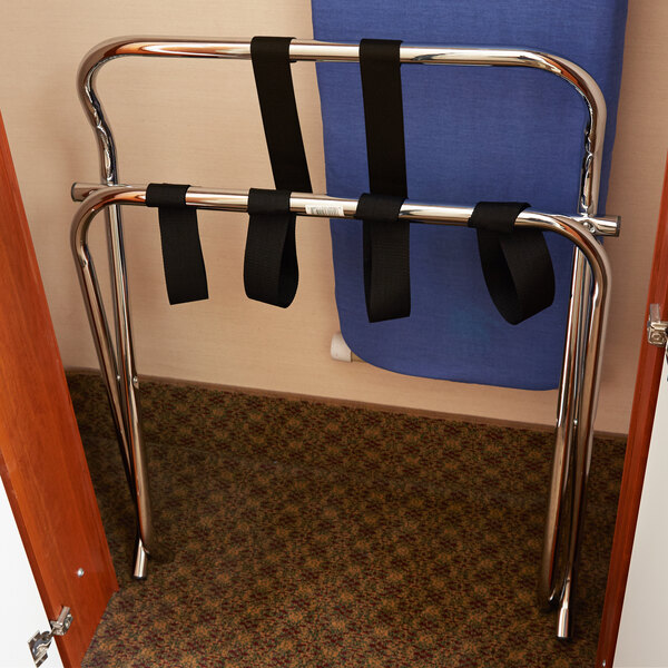 A chrome metal CSL high back luggage rack with wall guards.