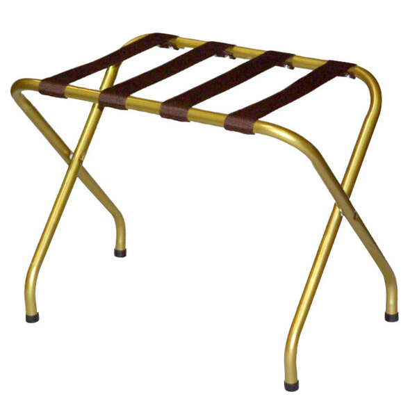 a gold metal luggage rack