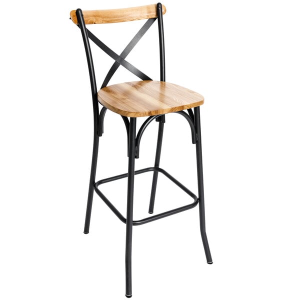 A BFM Seating Henry black steel bar stool with a natural wood seat.