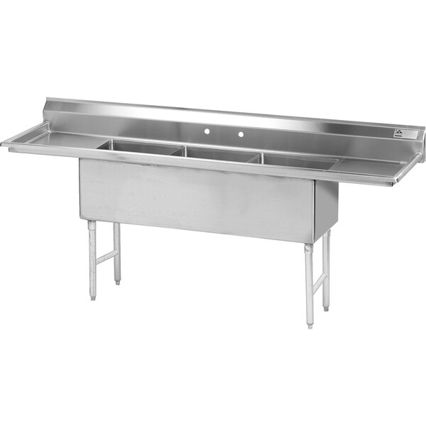 An Advance Tabco stainless steel three compartment sink with two drainboards.