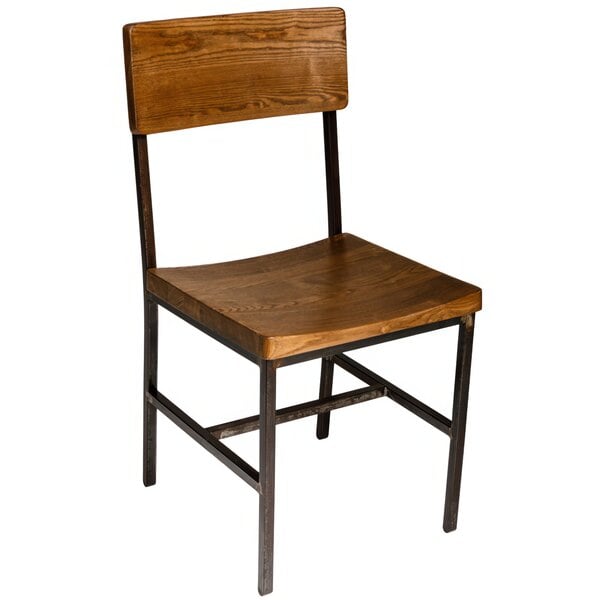A BFM Seating Memphis wooden side chair with metal legs and back.