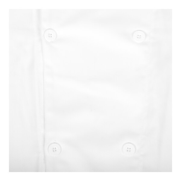 A close-up view of a white fabric garment with white buttons arranged in two parallel rows.