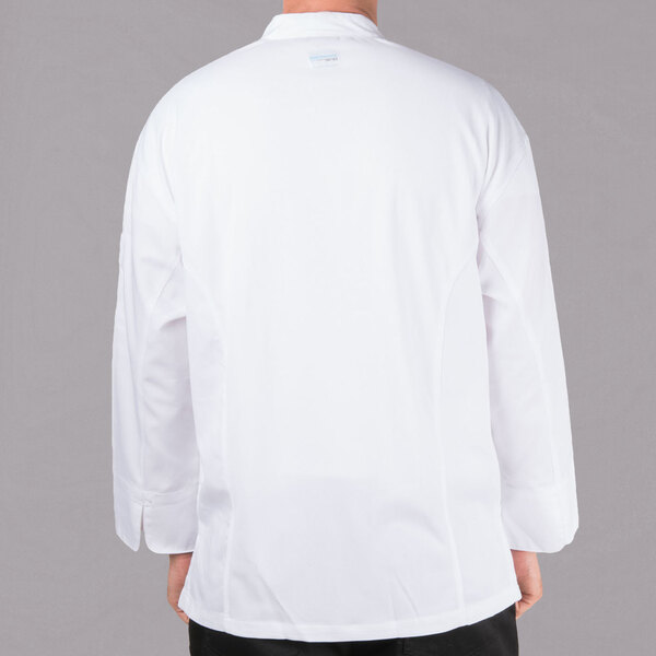 A person wearing a white Chef Revival long sleeve chef jacket with a mesh back.