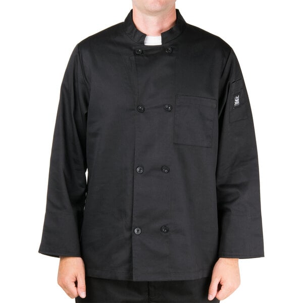 A man wearing a black Chef Revival chef coat.