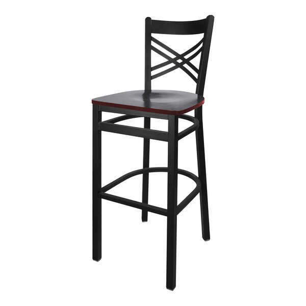 A black BFM Seating steel bar height chair with a mahogany seat and cross steel back.