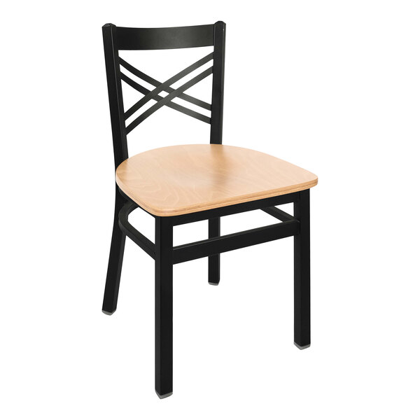 A BFM Seating black steel side chair with a natural ash wooden seat and cross steel back.