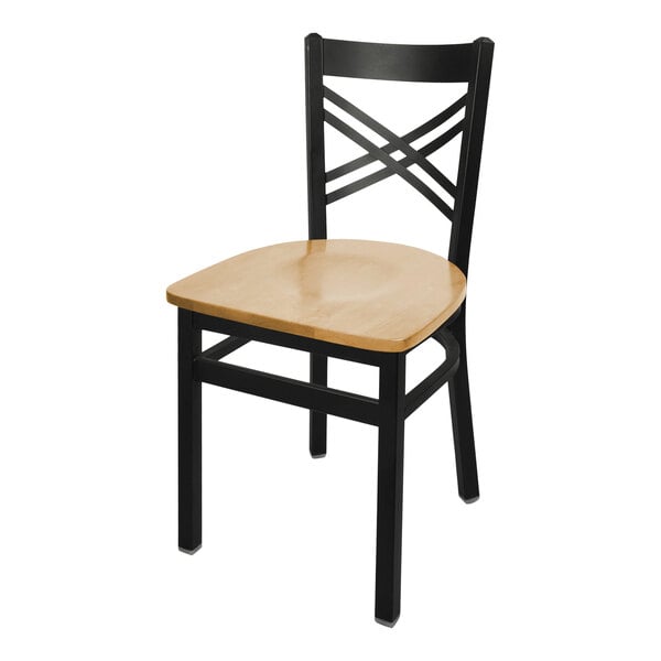 A BFM Seating black steel side chair with cherry wooden seat and cross steel back.