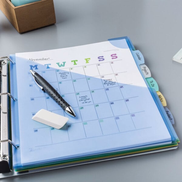 close-up of a file folder with colorful tabs