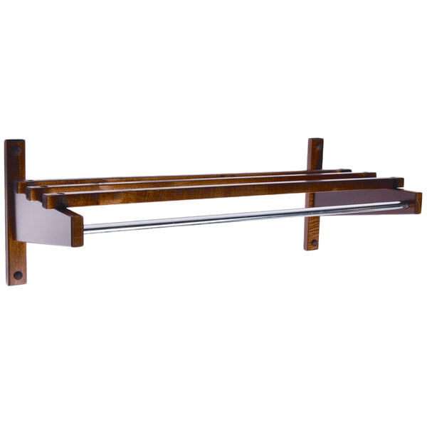 A CSL walnut hardwood wall mount coat rack with metal rods.