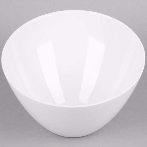An American Metalcraft white melamine serving bowl on a gray surface.