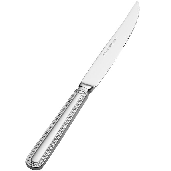 A Bon Chef stainless steel steak knife with a solid silver handle.