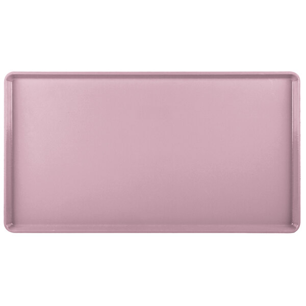 A pink rectangular Cambro dietary tray with a white border.