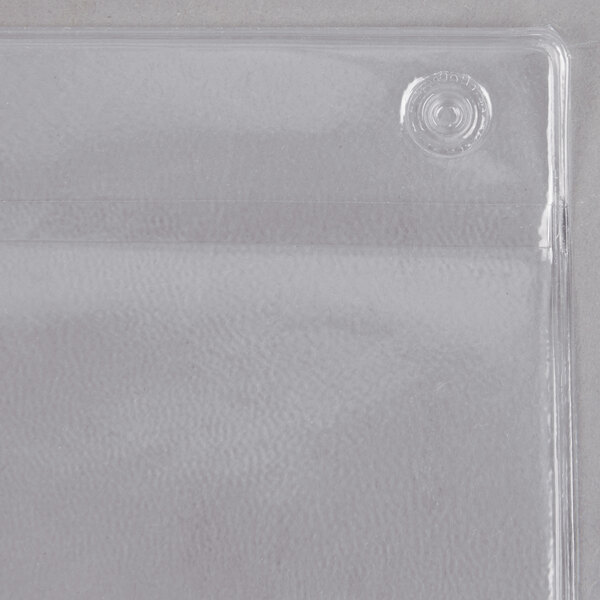 A clear plastic Menu Solutions page protector with 2 holes.